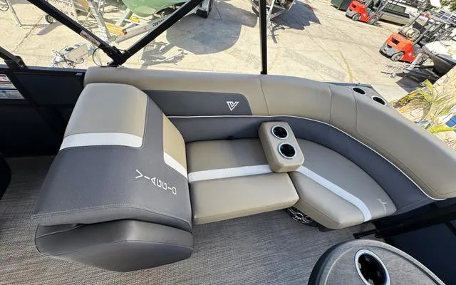 Slide: The Image of Luxurious seating on 2025 Viaggio Lago X 22 U pontoon boat with cup holders. - 33