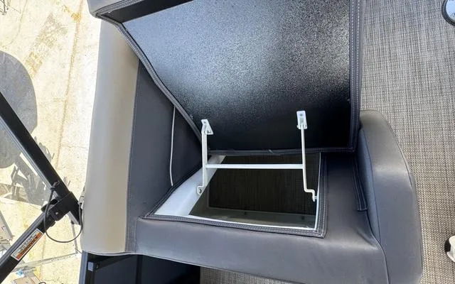 Slide: The Image of Open storage compartment in 2025 Viaggio Lago X 22 U boat seat. - 37