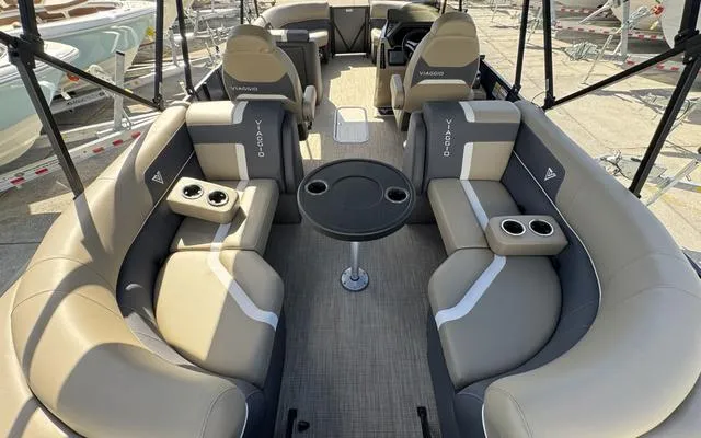 Slide: The Image of 2025 Viaggio Lago X 22 U boat interior with beige seating and cup holders. - 39