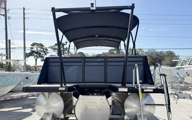 Slide: The Image of 2025 Viaggio Lago X 22 U pontoon boat, rear view with canopy and ladder. - 8