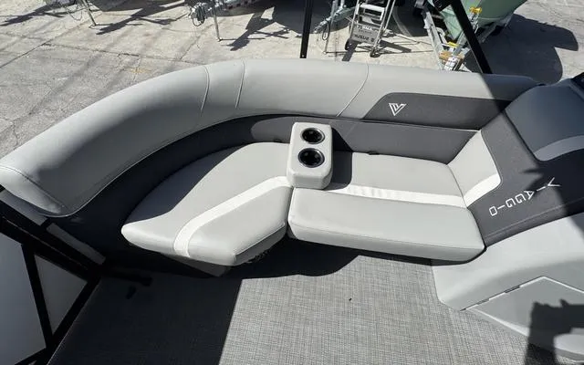 Slide: The Image of Luxurious seating on 2025 Viaggio Lago X 22 Q boat with cup holders. - 15