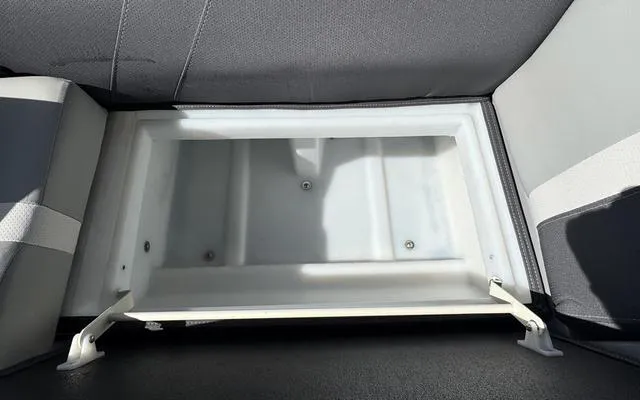 Slide: The Image of Storage compartment in 2025 Viaggio LAgo X 22 Q boat seat. - 17