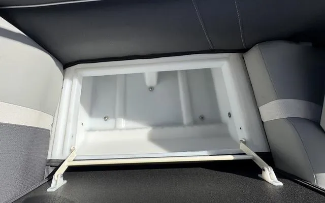 Slide: The Image of Open storage compartment in 2025 Viaggio LAgo X 22 Q boat seat. - 19