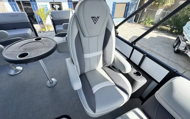 Slide: The Image of Luxurious seating in 2025 Viaggio LAgo X 22 Q boat with modern design and comfort. - 23