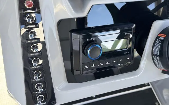 Slide: The Image of Control panel of 2025 Viaggio LAgo X 22 Q with Clarion audio system. - 27