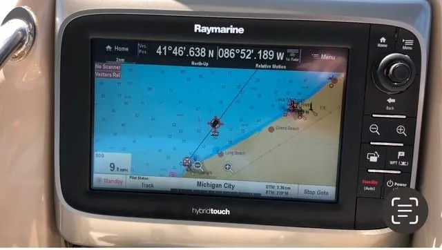 Slide: The Image of Raymarine GPS display on 2003 Sea Ray 340 Sundancer, showing Michigan City navigation. - 9