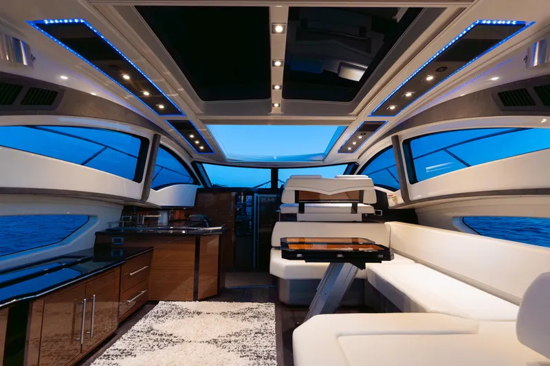 Slide: The Image of Luxurious interior of 2009 Marquis 420 Sport Coupe yacht with modern design and ambient lighting. - 11