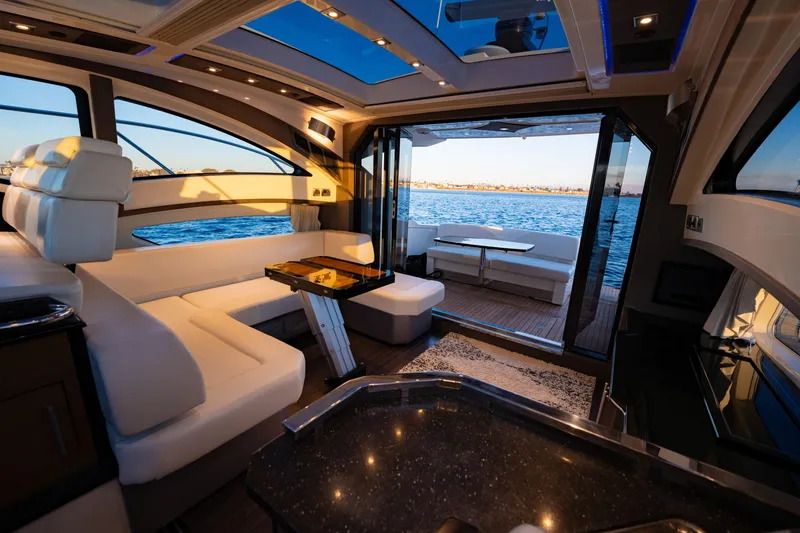 Slide: The Image of Luxurious interior of 2009 Marquis 420 Sport Coupe yacht with ocean view. - 16