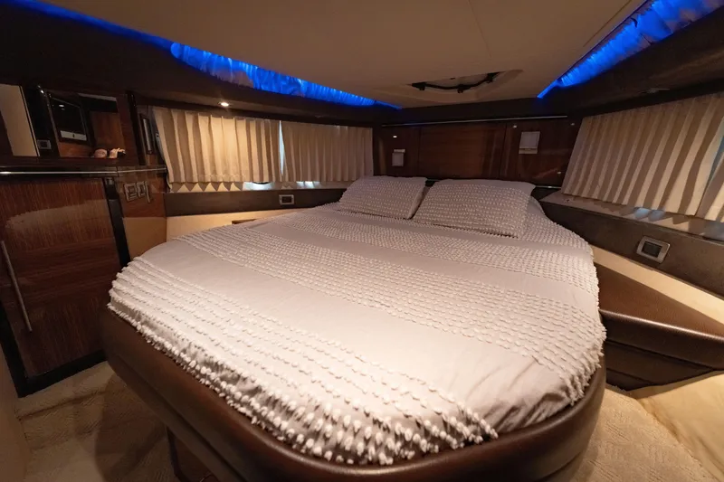 Slide: The Image of Luxurious bedroom interior of 2009 Marquis 420 Sport Coupe yacht. - 19
