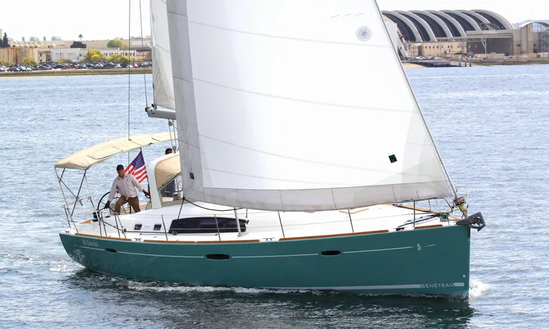 Slide: The Image of Sailing yacht Beneteau Oceanis 50, 2012 model, cruising on calm waters with sails unfurled. - 1