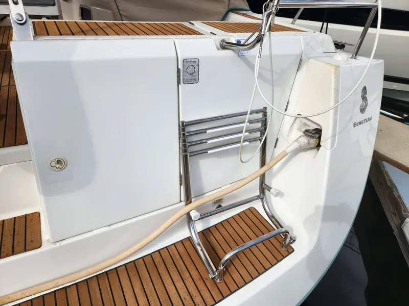 Slide: The Image of Beneteau Oceanis 50 yacht stern with teak deck and ladder, 2012 model. - 13
