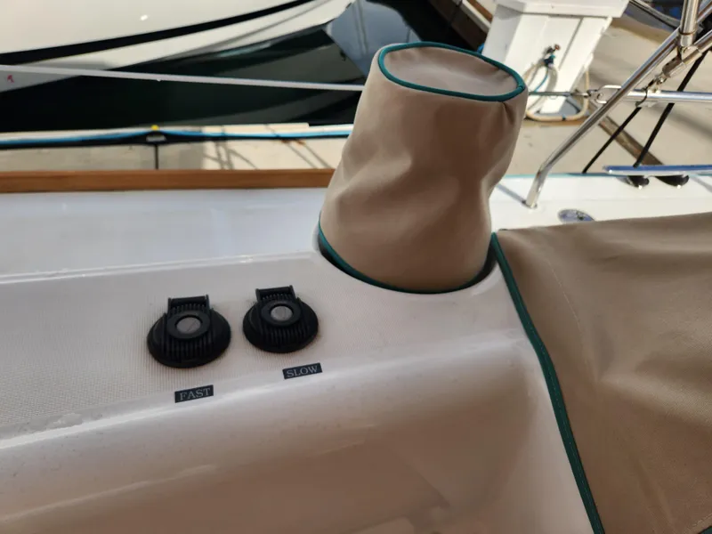 Slide: The Image of Beneteau Oceanis 50 sailboat deck controls, 2012 model, featuring fast and slow settings. - 16