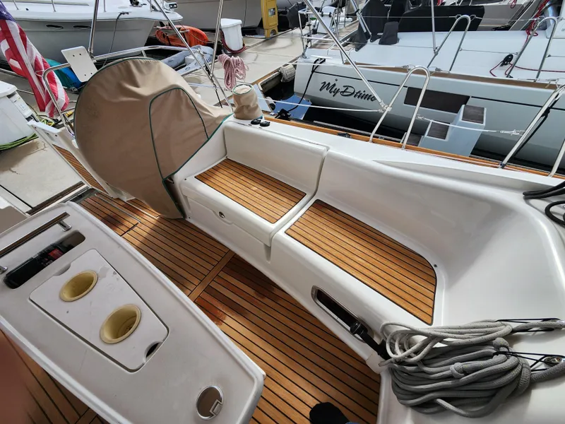 Slide: The Image of Beneteau Oceanis 50 sailboat cockpit with teak flooring, 2012 model, docked at marina. - 19