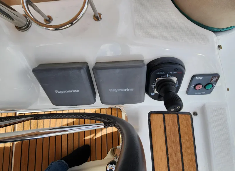 Slide: The Image of Control panel of a 2012 Beneteau Oceanis 50 sailboat with Raymarine equipment. - 21