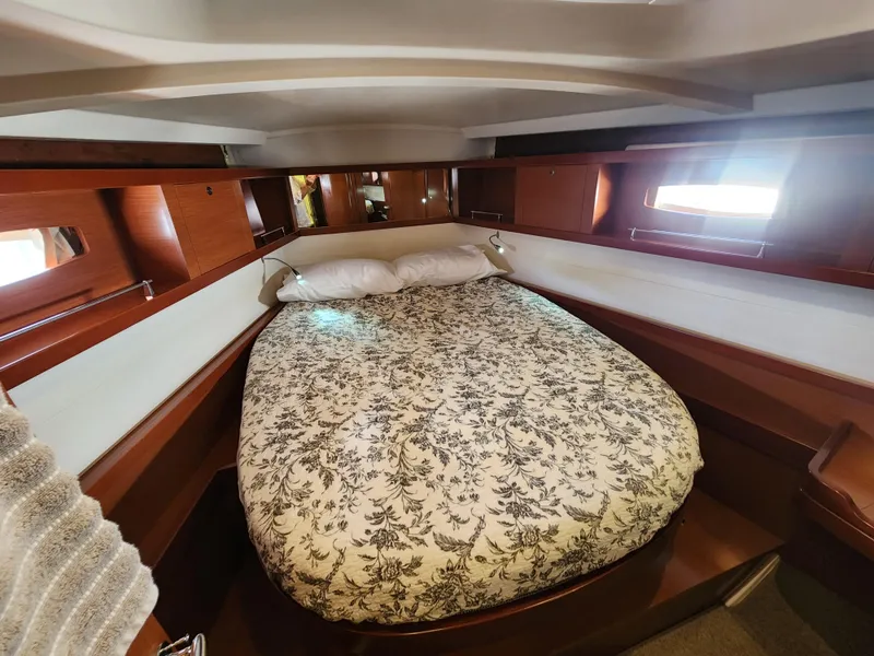 Slide: The Image of Cozy cabin interior of 2012 Beneteau Oceanis 50 with floral bedding. - 34
