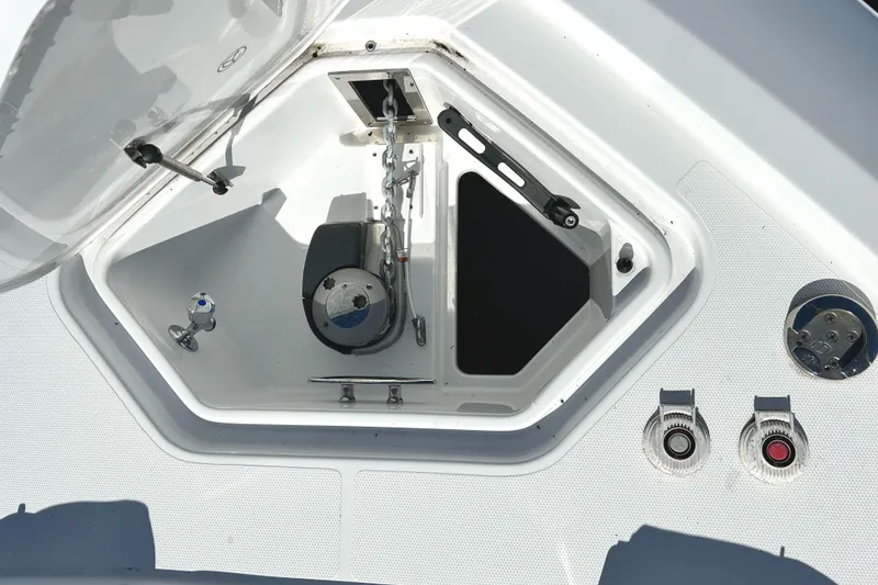 Slide: The Image of 2022 Cruisers Yachts 42 Cantius anchor compartment with controls and fittings. - 21