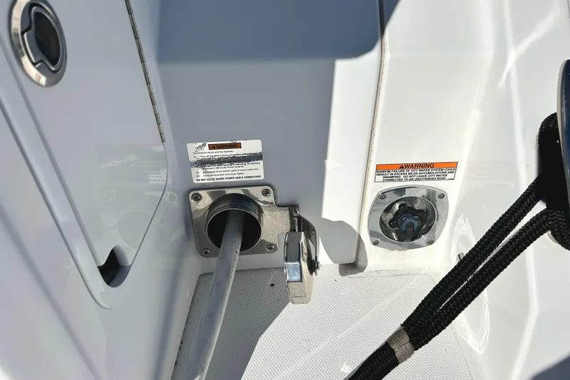 Slide: The Image of Fuel and water connections on 2022 Cruisers Yachts 42 Cantius boat. - 23