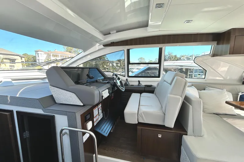 Slide: The Image of Interior of 2022 Cruisers Yachts 42 Cantius with modern helm and seating. - 30