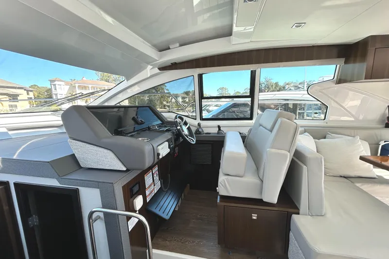 Slide: The Image of Interior of 2022 Cruisers Yachts 42 Cantius with modern helm and seating. - 31