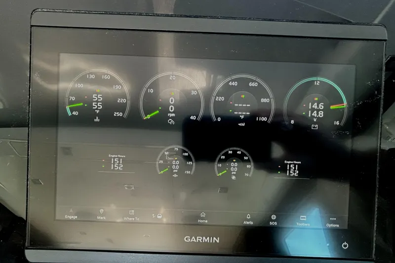 Slide: The Image of Garmin display on 2022 Cruisers Yachts 42 Cantius showing engine metrics and gauges. - 42