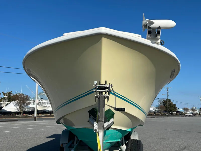 Slide: The Image of Front view of a 2000 Regulator 32 Classic boat on a trailer. - 5