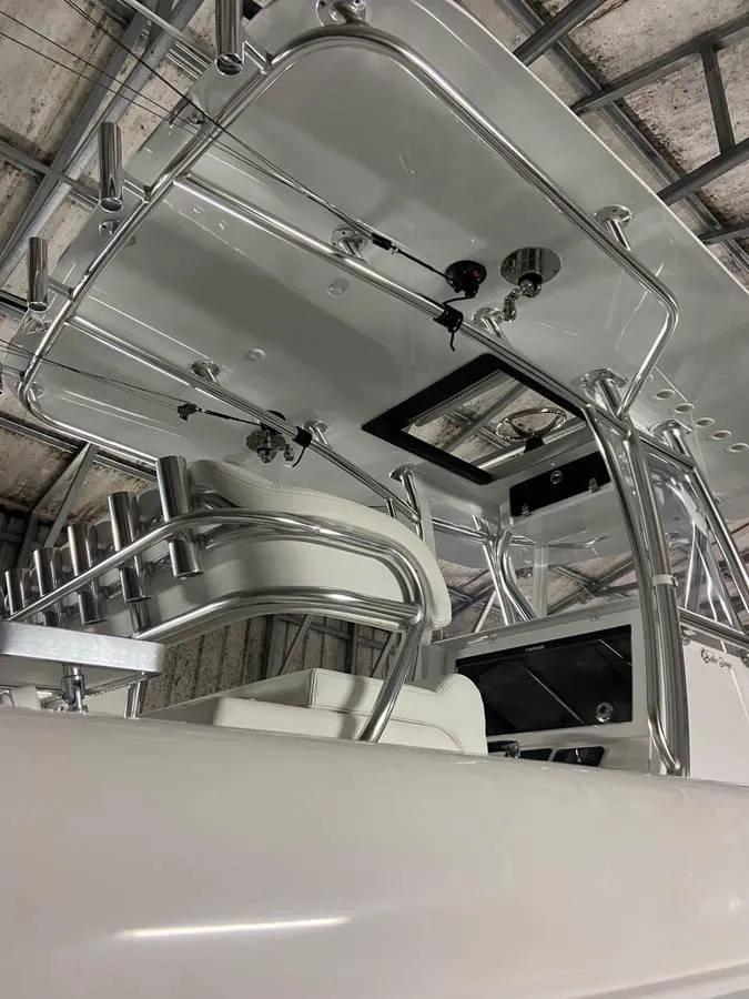 Slide: The Image of 2024 Contender 35 ST boat with sleek design and modern features. - 10