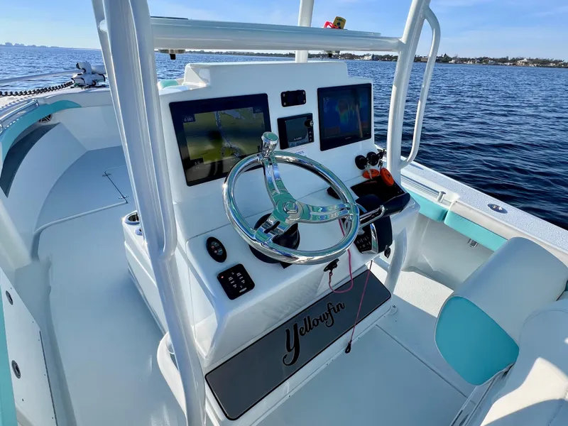 Slide: The Image of 2022 Yellowfin 26 Hybrid boat dashboard with twin 225 Mercury engines, only 36 hours used. - 23