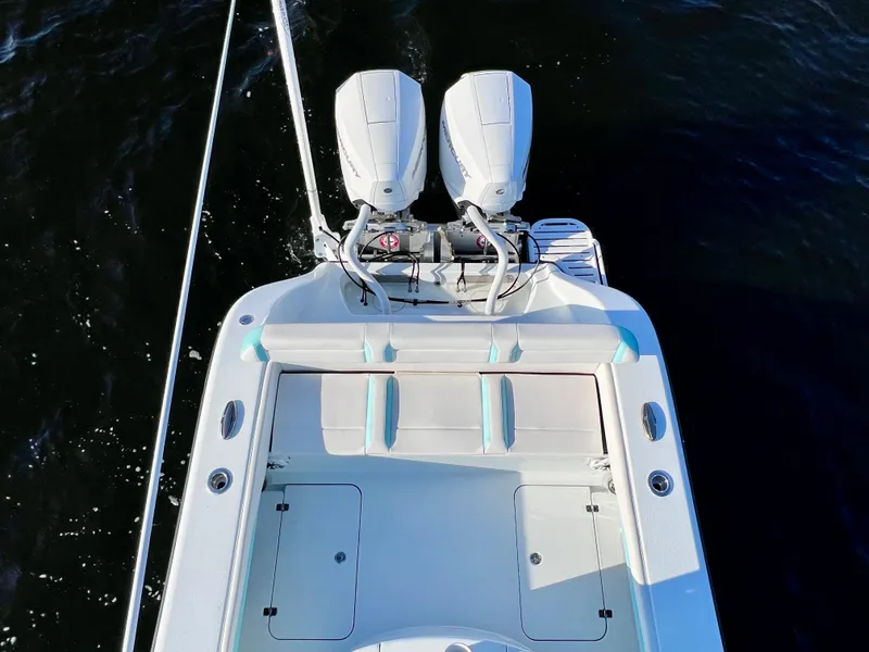 Slide: The Image of 2022 Yellowfin 26 Hybrid boat with twin 225 Mercury engines, aerial view. - 43
