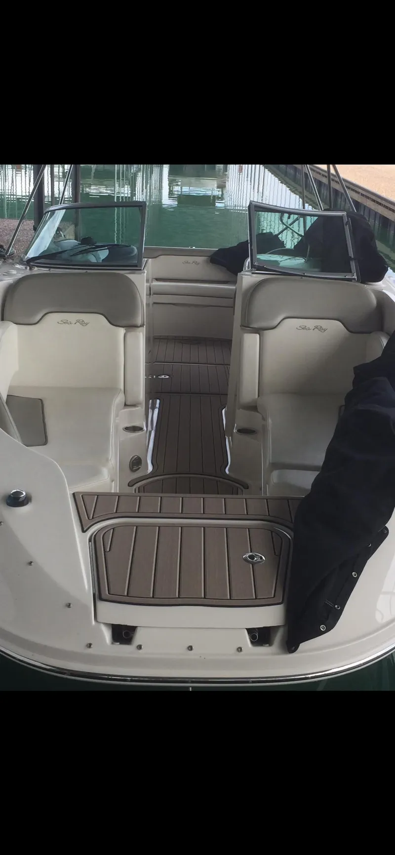 Slide: The Image of 2007 Sea Ray 260 Sundeck boat interior with seating and deck view. - 18