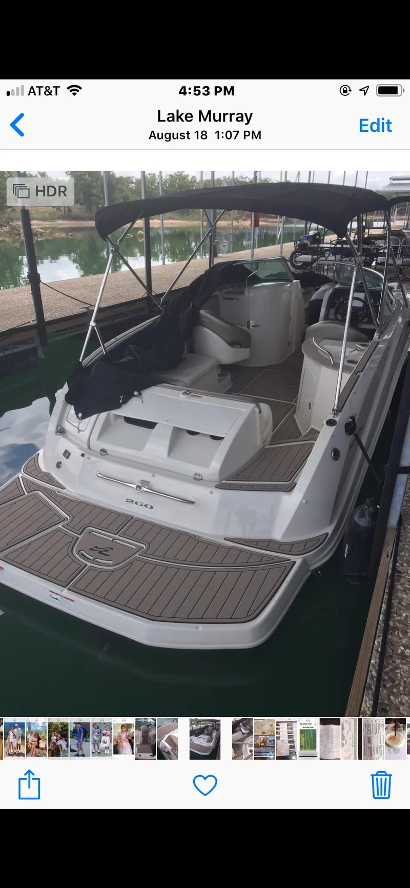 Slide: The Image of 2007 Sea Ray 260 Sundeck boat docked at Lake Murray with canopy and seating area. - 19