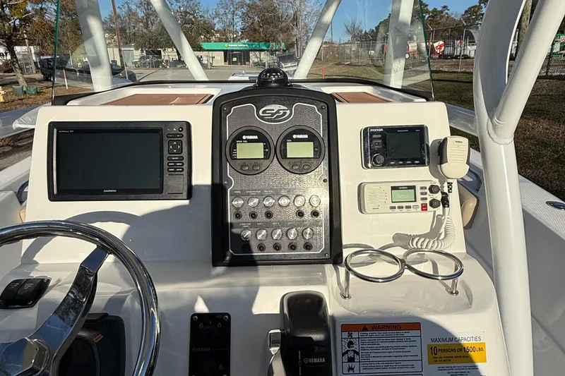 Slide: The Image of 2017 Sea Fox 246 Commander boat dashboard with navigation and communication equipment. - 10