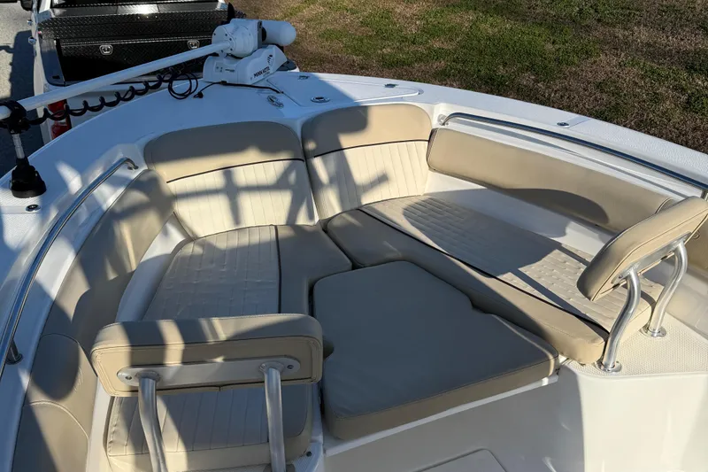 Slide: The Image of 2017 Sea Fox 246 Commander boat with beige seating and trolling motor. - 14