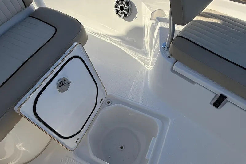 Slide: The Image of 2017 Sea Fox 246 Commander boat interior with seating and storage compartment. - 16