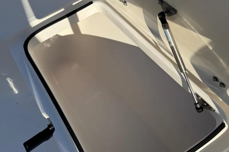 Slide: The Image of Open storage compartment on 2017 Sea Fox 246 Commander boat. - 17