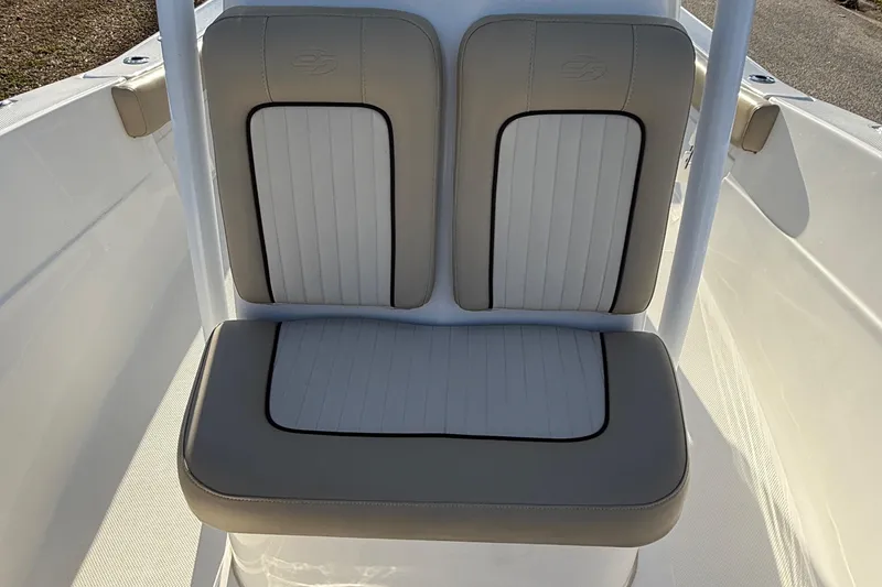 Slide: The Image of 2017 Sea Fox 246 Commander boat seating with beige and white upholstery. - 20