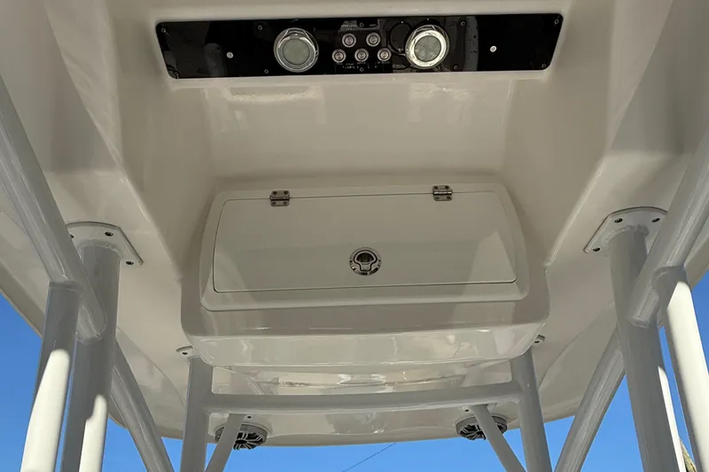 Slide: The Image of 2017 Sea Fox 246 Commander boat console with storage compartment and controls. - 26