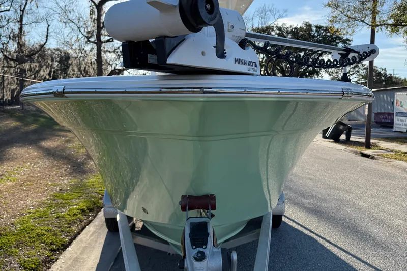 Slide: The Image of 2017 Sea Fox 246 Commander boat on trailer, front view, outdoors. - 3
