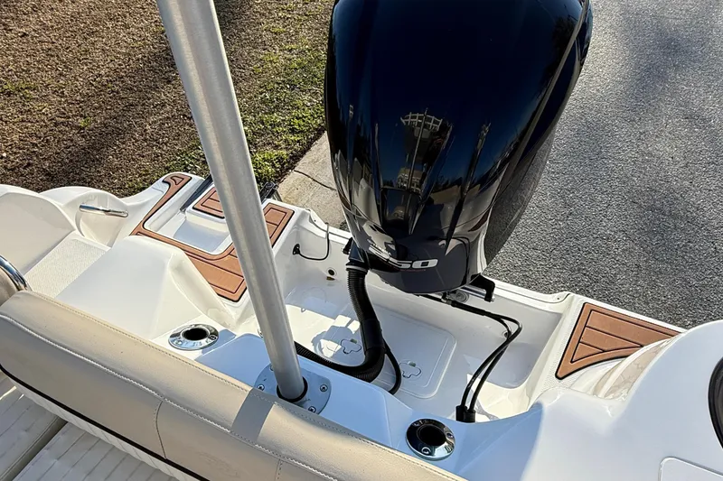 Slide: The Image of 2017 Sea Fox 246 Commander boat with outboard motor and seating area. - 30