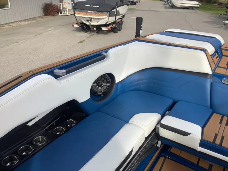 Slide: The Image of Rear view of a 2023 Supra SE with SwellSurf technology. - 17