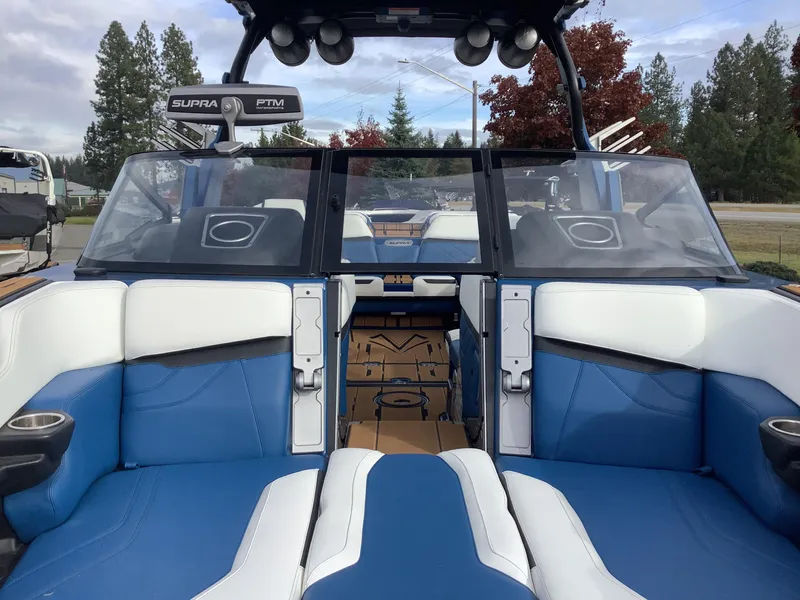 Slide: The Image of 2023 Supra SE boat on trailer, ready for adventure. - 4