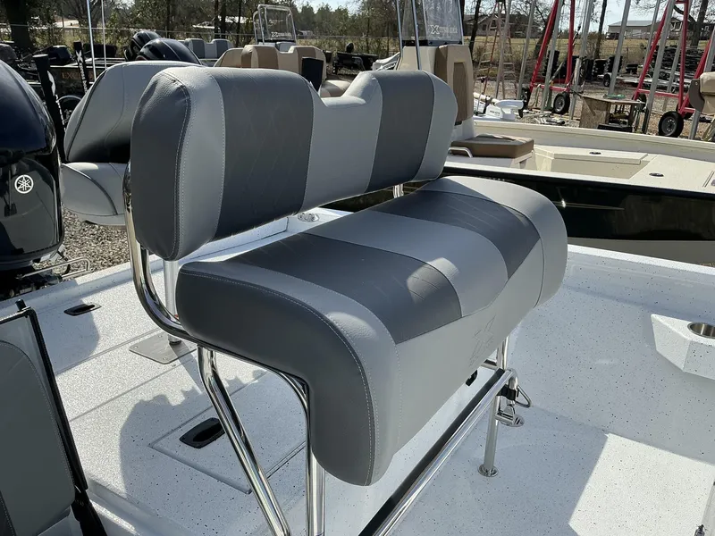 Slide: The Image of 2025 Xpress Hyper-Lift Series H20B boat console with cushioned seating. - 3