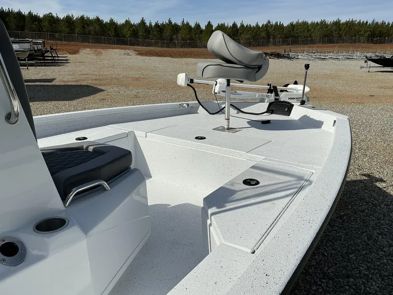 Slide: The Image of 2025 Xpress Hyper-Lift Series H20B boat with new console, featuring sleek seating and deck design. - 4