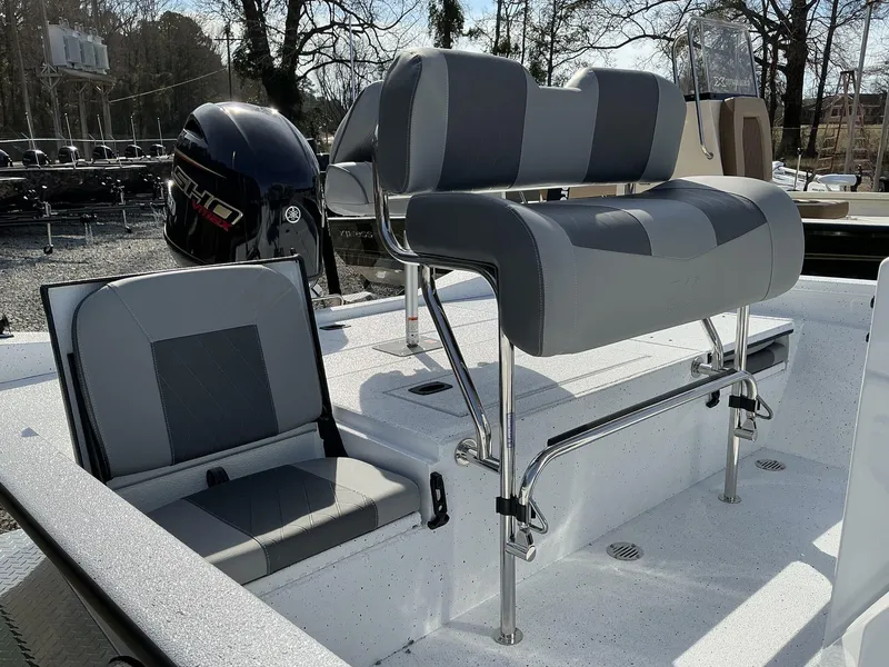 Slide: The Image of 2025 Xpress Hyper-Lift Series H20B boat interior with new console and seating. - 6