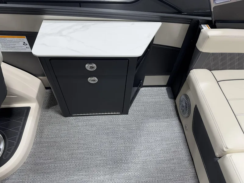 Slide: The Image of 2025 Barletta Lusso L25UEA interior with marble countertop and seating. - 16