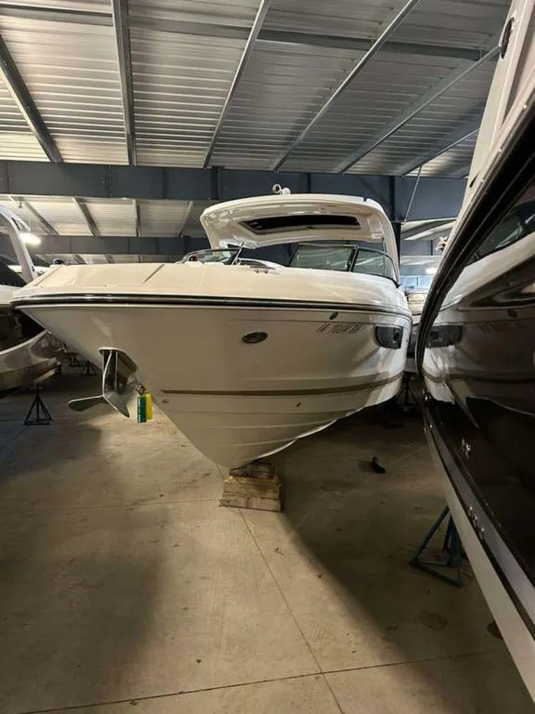 Slide: The Image of 2015 Sea Ray 350 SLX boat in indoor storage facility. - 5