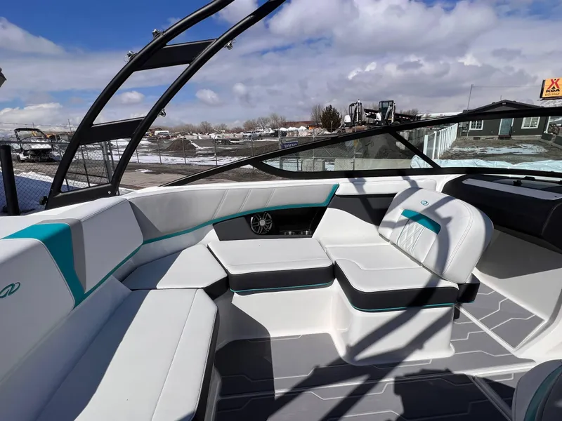 Slide: The Image of 2023 Regal 21 OBX boat interior with modern seating and sleek design. - 16