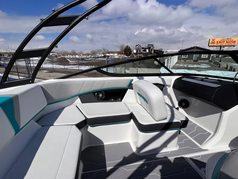 Slide: The Image of 2023 Regal 21 OBX boat interior with modern seating and sleek design. - 18