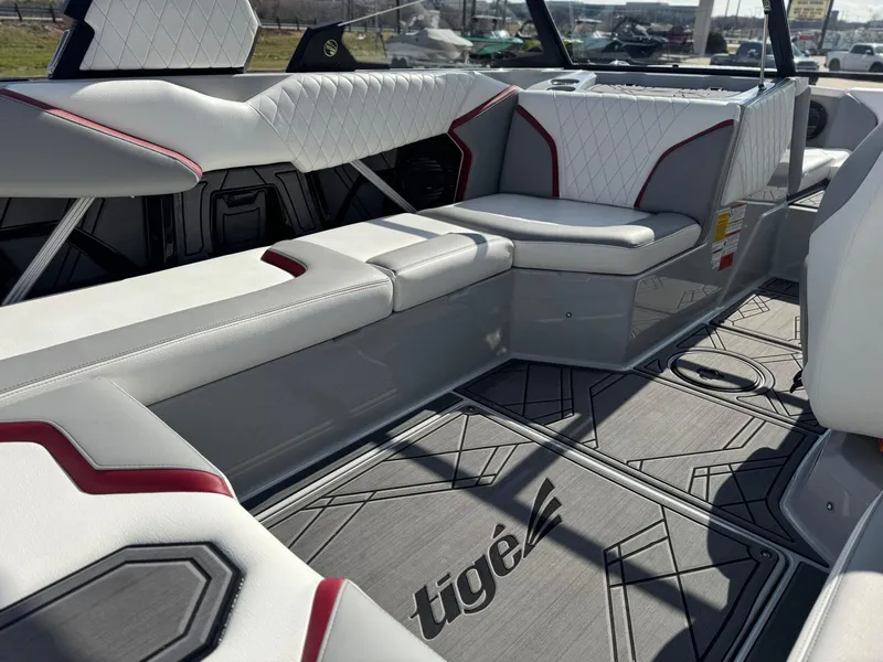 Slide: The Image of Interior of 2023 Tigé 22RZX boat with stylish seating and flooring. - 12