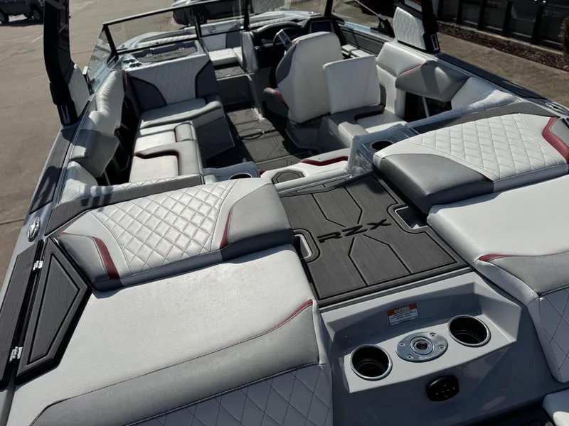 Slide: The Image of 2023 Tigé 22RZX boat interior with luxurious seating and modern design. - 7