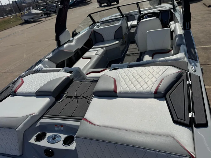 Slide: The Image of 2023 Tigé 22RZX boat interior with luxurious seating and modern design. - 8